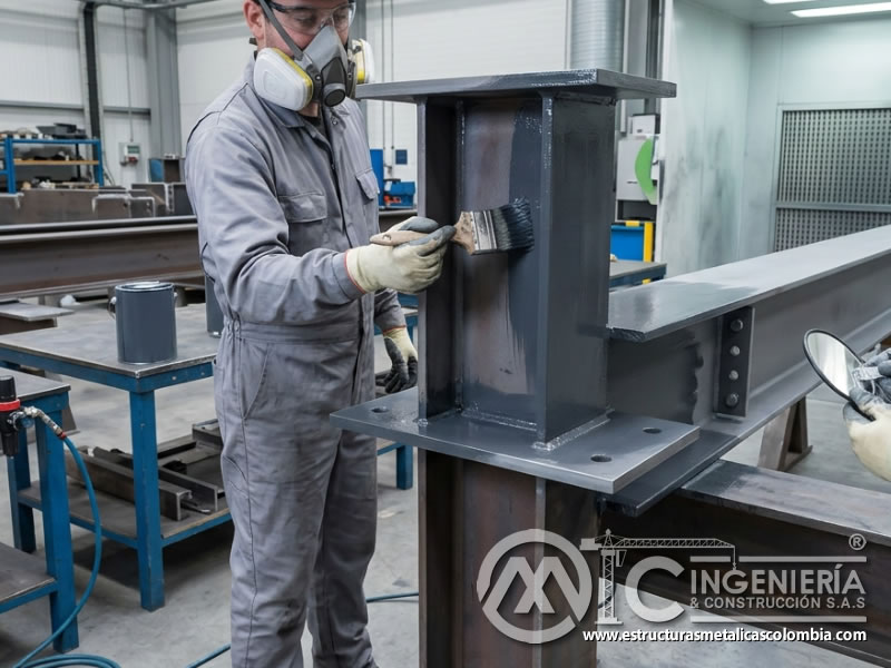 Brocha industrial en bordes y soldaduras metálicas en Bogotá, Colombia. Montajes, Ingeniería y Construcción. MIC SAS.