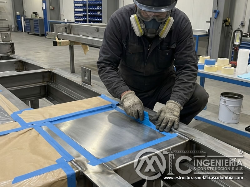 Cumplimiento técnico en preparación de superficie para pintura industrial en Bogotá, Colombia. Montajes, Ingeniería y Construcción. MIC SAS.
