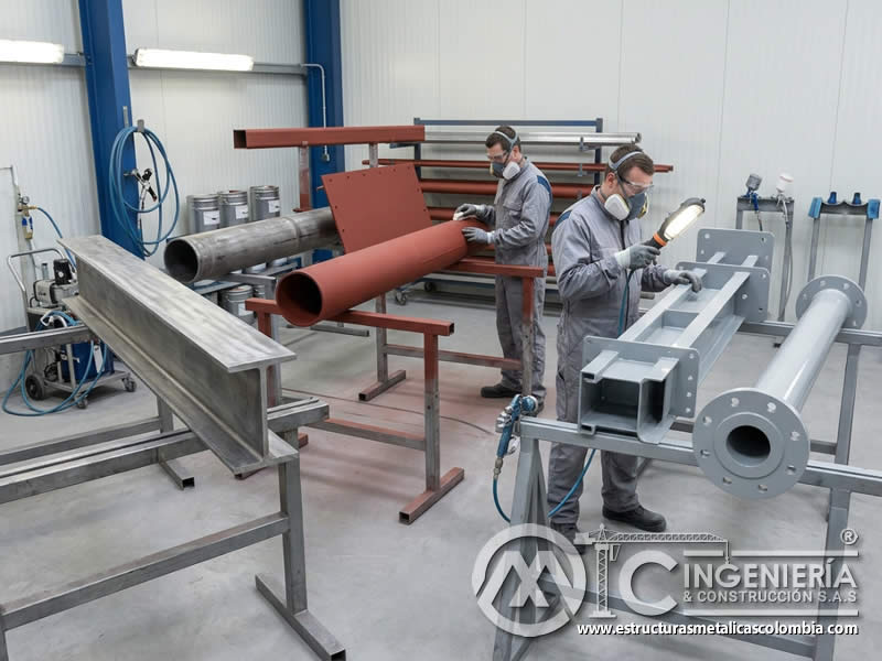 Proceso de aplicación de pintura industrial marítima con preparación, imprimación, recubrimiento y control de película en Bogotá, Colombia. Montajes, Ingeniería y Construcción. MIC SAS.
