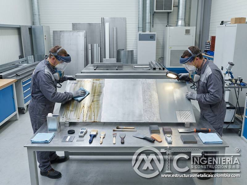 Grasa y aceite como barrera contra la adherencia del recubrimiento industrial en Bogotá, Colombia. Montajes, Ingeniería y Construcción. MIC SAS.