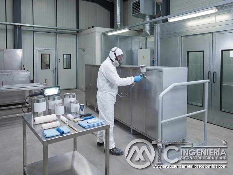 Seguridad en aplicación de pintura antimicrobiana industrial en Bogotá, Colombia. Montajes, Ingeniería y Construcción. MIC SAS.