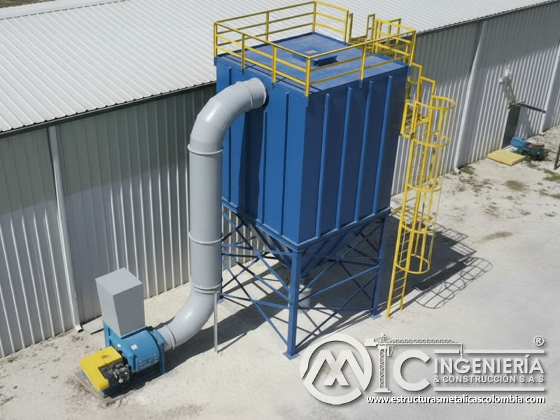Colector de polvo exterior con tolva cónica y ventilador centrífugo en Bogotá, Colombia. Montajes, Ingeniería y Construcción. MIC SAS.