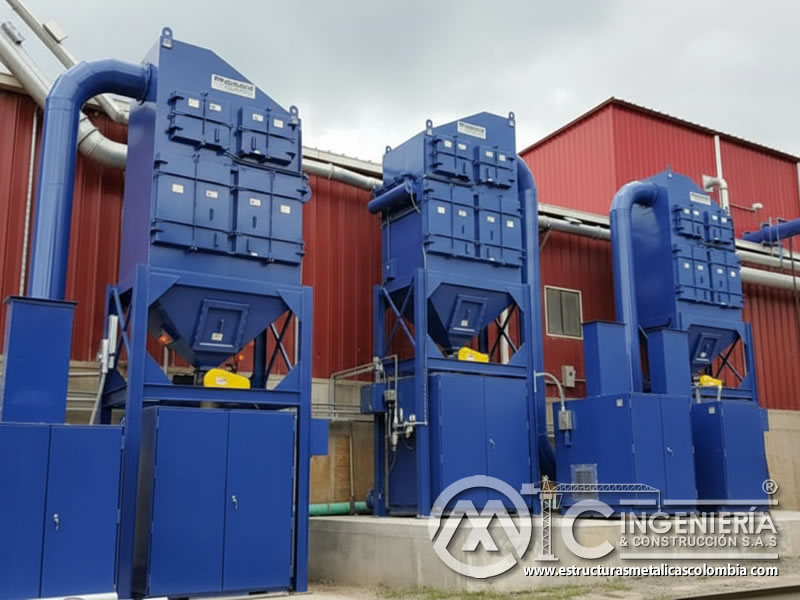 Colectores industriales de polvo con tolva y válvulas rotativas en Bogotá, Colombia. Montajes, Ingeniería y Construcción. MIC SAS.