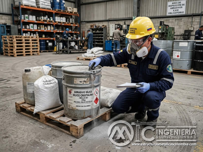 Inspección de contenedores de abrasivos para detectar daños, fugas, polvo acumulado y riesgos de derrame en Bogotá, Colombia. Montajes, Ingeniería y Construcción. MIC SAS.