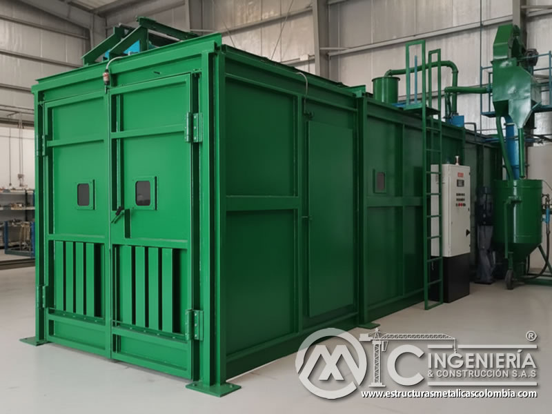 Cabina de granallado con sistema extractor y colector de polvo en Bogotá, Colombia. Montajes, Ingeniería y Construcción. MIC SAS.