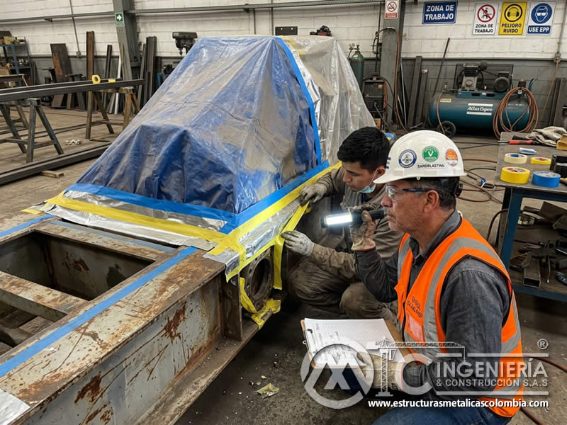 Protección precisa con cintas y cobertores durante sandblasting en Bogotá, Colombia. Montajes, Ingeniería y Construcción. MIC SAS. Protección precisa con cintas y cobertores durante sandblasting en Bogotá, Colombia. Montajes, Ingeniería y Construcción. MIC SAS.