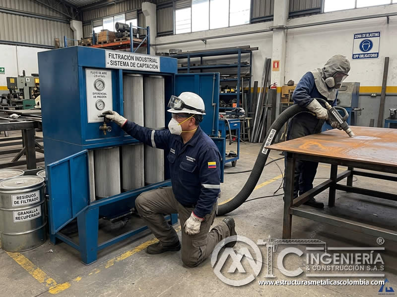 Filtración de polvo en granallado de superficie metálica en Bogotá, Colombia. Montajes, Ingeniería y Construcción. MIC SAS. Filtración de polvo en granallado de superficie metálica en Bogotá, Colombia. Montajes, Ingeniería y Construcción. MIC SAS.